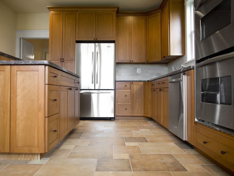 kitchen with stainless steel appliances and tile floors